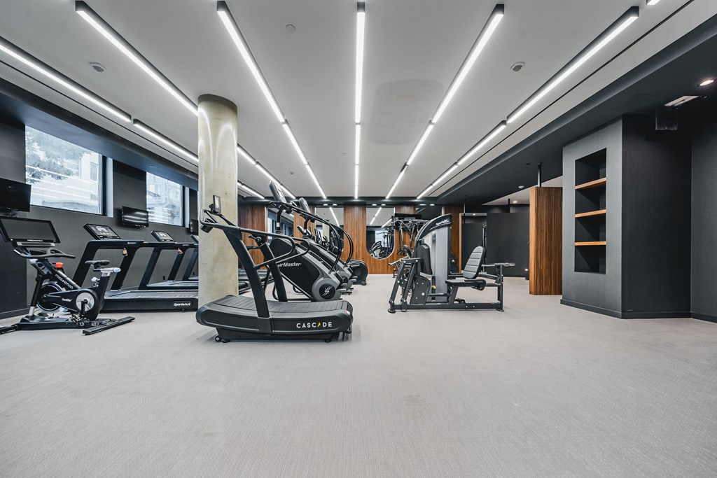 the gym has treadmills and other exercise equipment in it